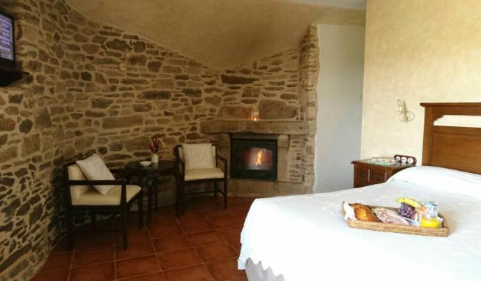 Postel nebo postele na pokoji v ubytování Casa rural osvilares