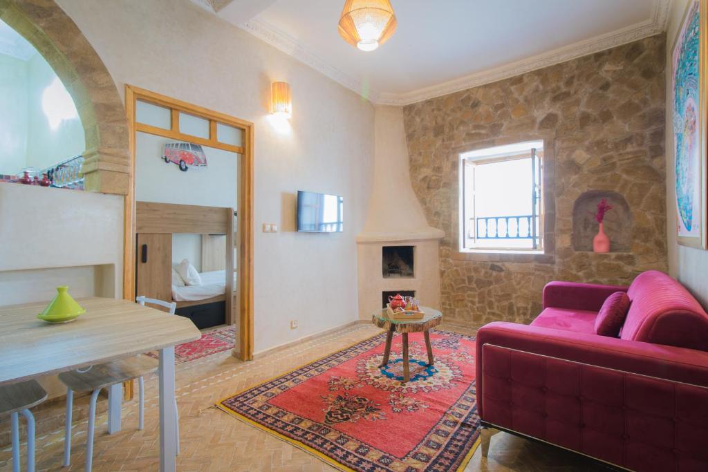 Гостиная зона в Stella 2 - appartement spacieux avec cheminée medina Essaouira