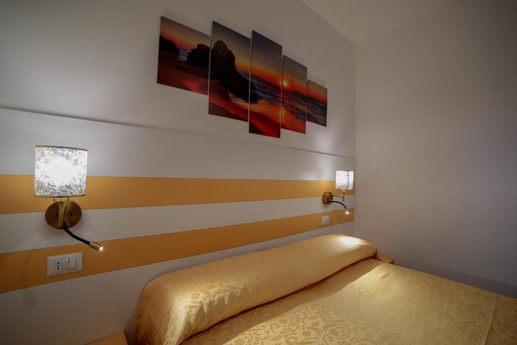 Postel nebo postele na pokoji v ubytování Amalfi Coast Ncopp' a' Scalinatella