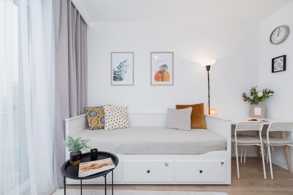 Posteľ alebo postele v izbe v ubytovaní Saska Blu Studios Premium by Noclegi Renters