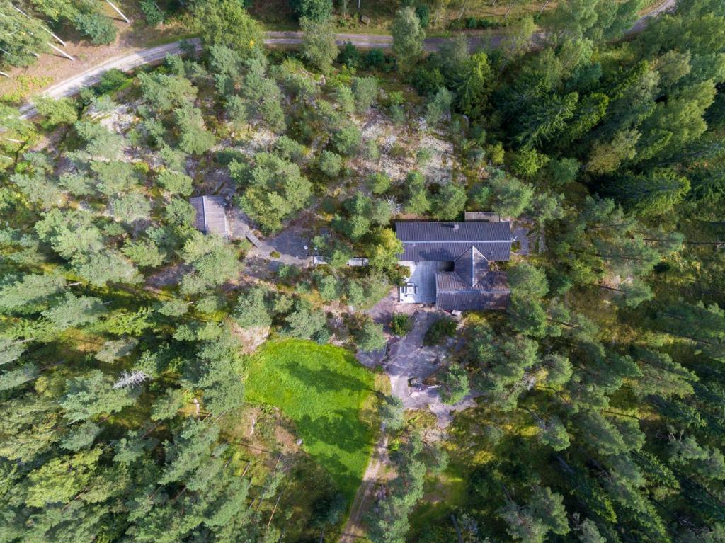 an aerial view of a house in the woods at Villa Mustikka in Ekenäs