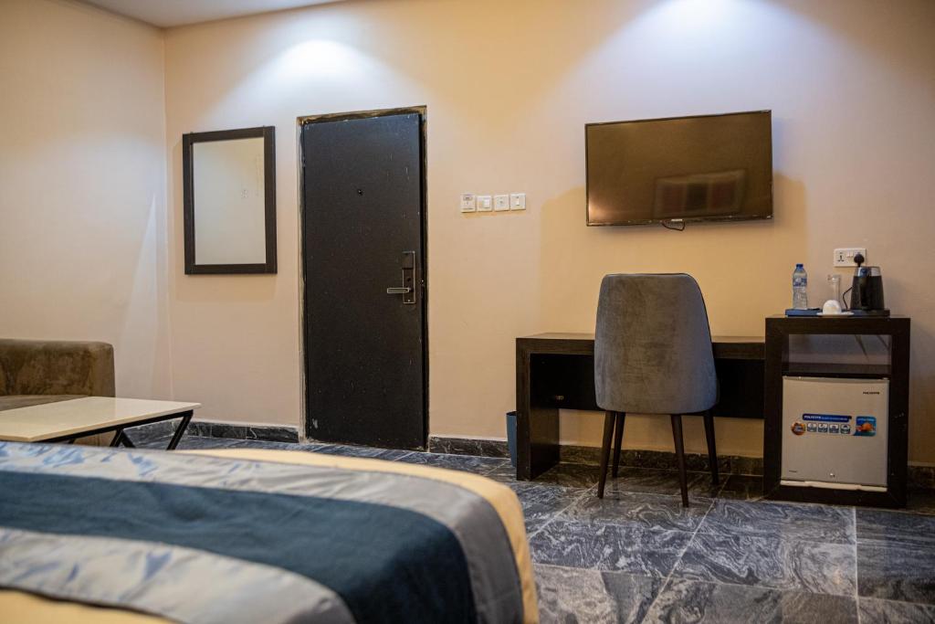 Postel nebo postele na pokoji v ubytování Residency Hotel Lekki Phase 1