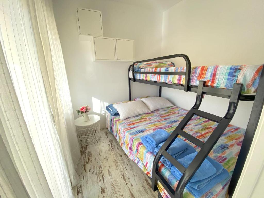 Postel nebo postele na pokoji v ubytování Hermoso Apartamento Vintage