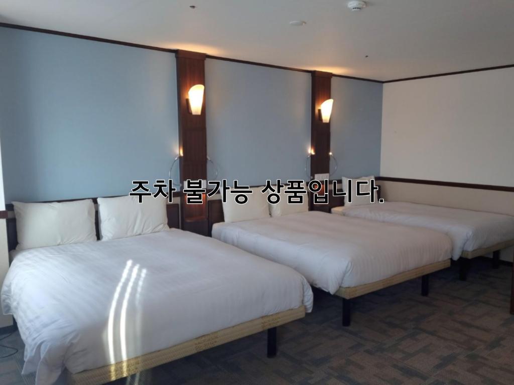 Postel nebo postele na pokoji v ubytování Toyoko Inn Busan Haeundae 2