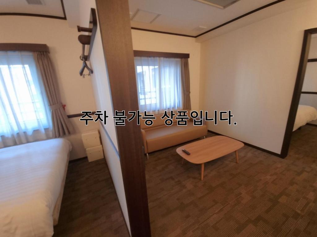 Postel nebo postele na pokoji v ubytování Toyoko Inn Busan Haeundae 2