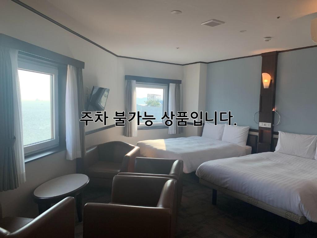 Postel nebo postele na pokoji v ubytování Toyoko Inn Busan Haeundae 2