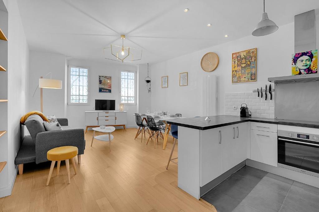 Kuchyň nebo kuchyňský kout v ubytování L'île aux Tounis - T3 Moderne centre de Toulouse