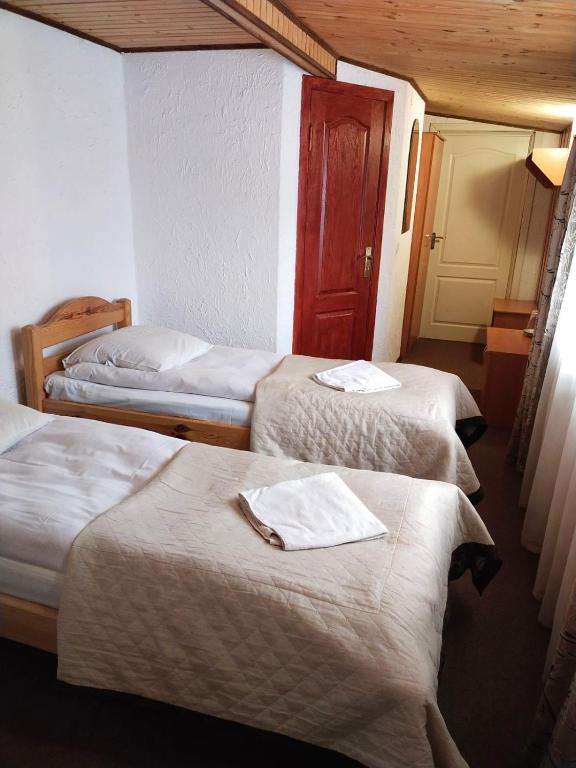 Postel nebo postele na pokoji v ubytování Ra