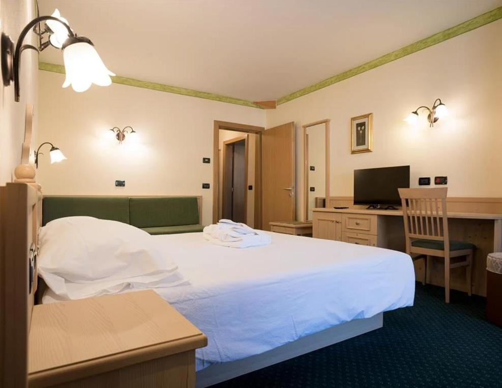Postel nebo postele na pokoji v ubytování Hotel Crepei