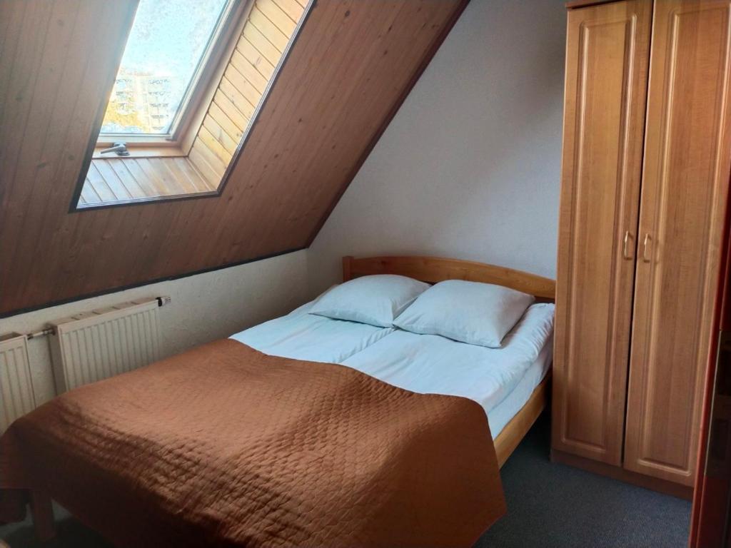 Postel nebo postele na pokoji v ubytování Ra