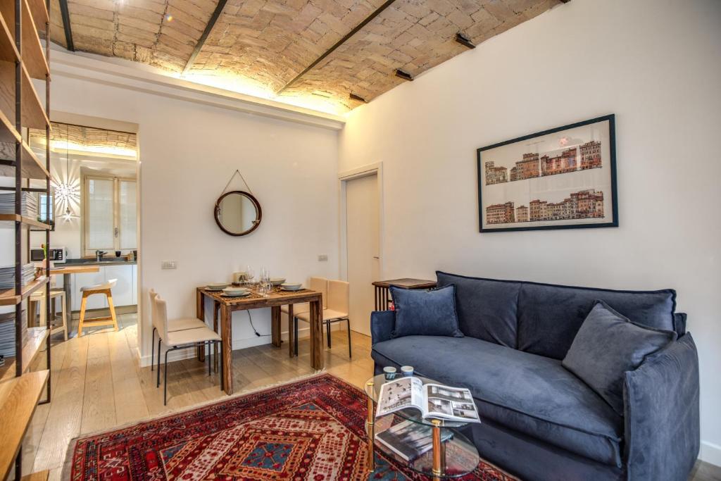 A seating area at PgrHome Borgo Vittorio