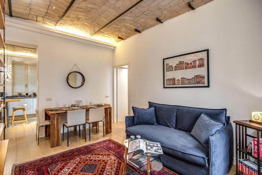 A seating area at PgrHome Borgo Vittorio