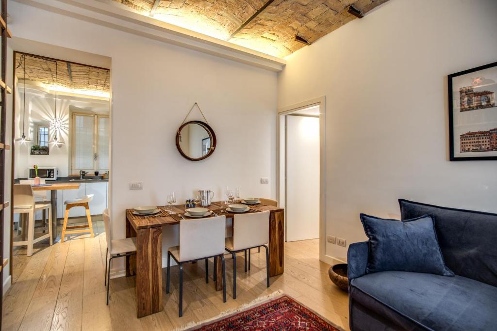 A seating area at PgrHome Borgo Vittorio