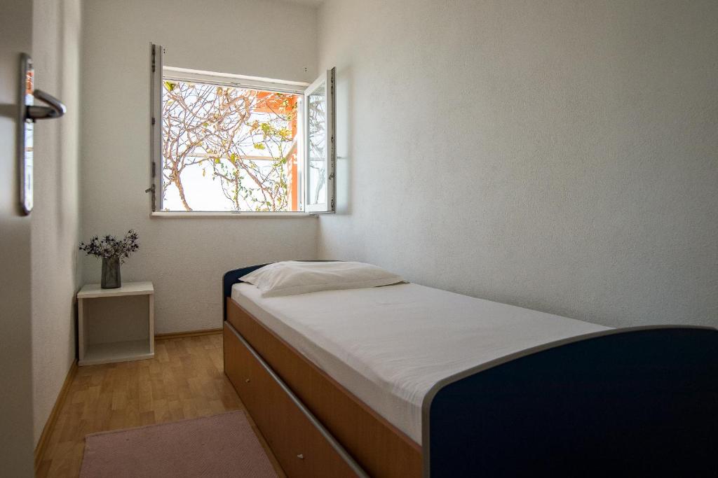 Postel nebo postele na pokoji v ubytování Lemon tree