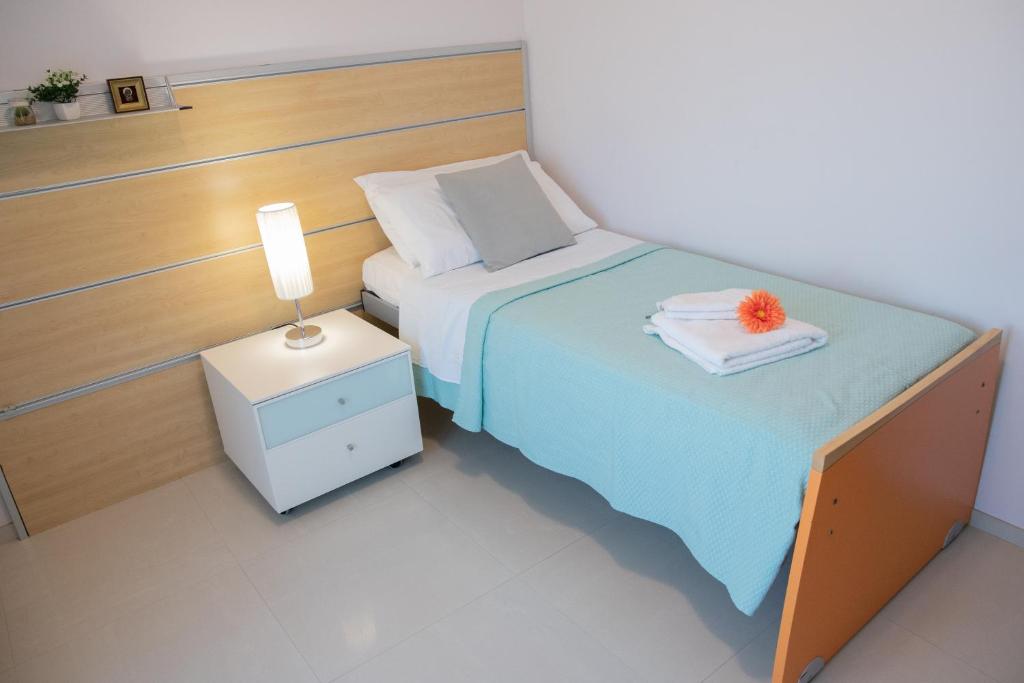 Posteľ alebo postele v izbe v ubytovaní Ki Vista Apartment