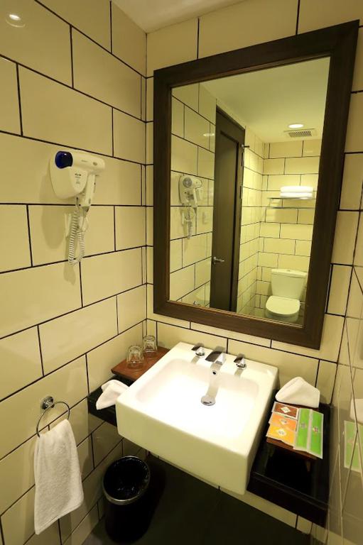 Koupelna v ubytování Namin Dago Hotel