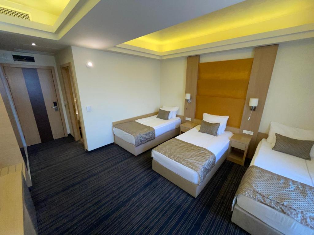 Postel nebo postele na pokoji v ubytování Spa Hotel Terme