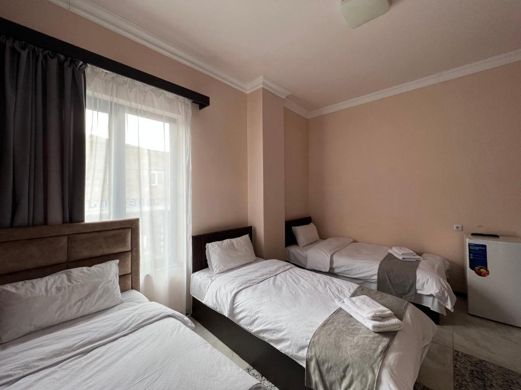 Postel nebo postele na pokoji v ubytování RP HOTEL (NEW)