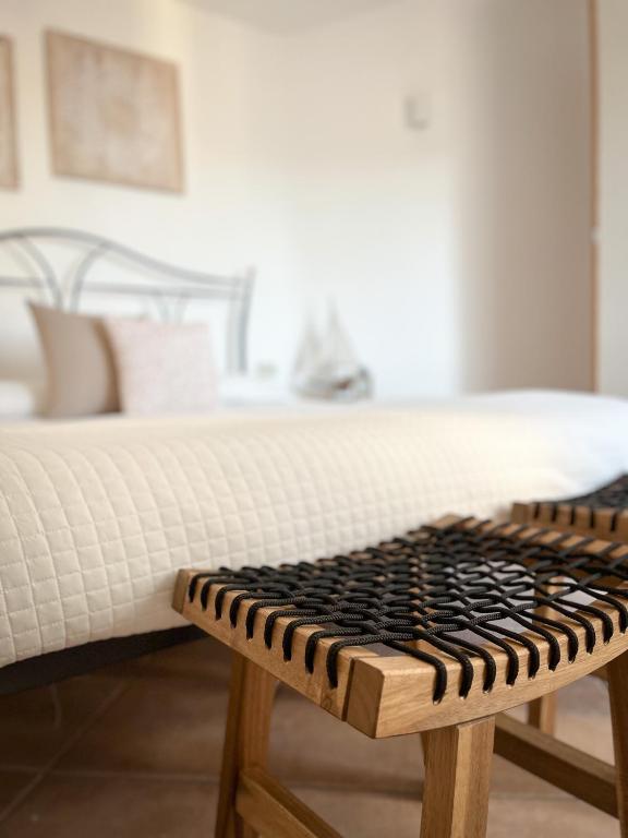 A bed or beds in a room at Casa Carmen - Attico vista mare