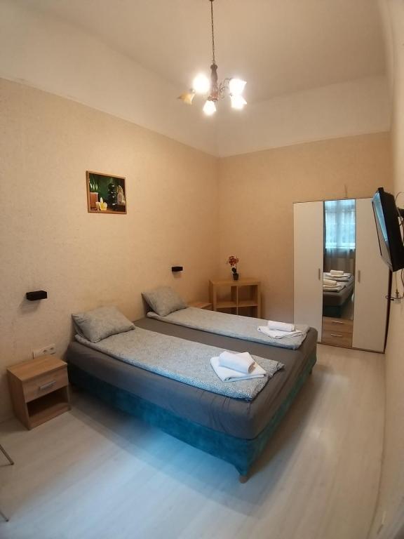 Posteľ alebo postele v izbe v ubytovaní Melisa Apartment