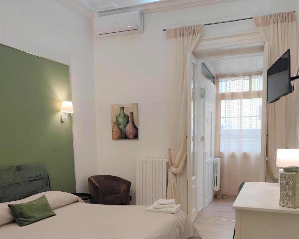 Łóżko lub łóżka w pokoju w obiekcie Casa Decò Business Stay Solution
