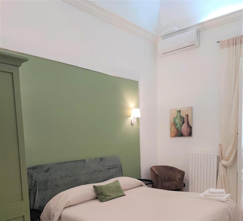 Łóżko lub łóżka w pokoju w obiekcie Casa Decò Business Stay Solution
