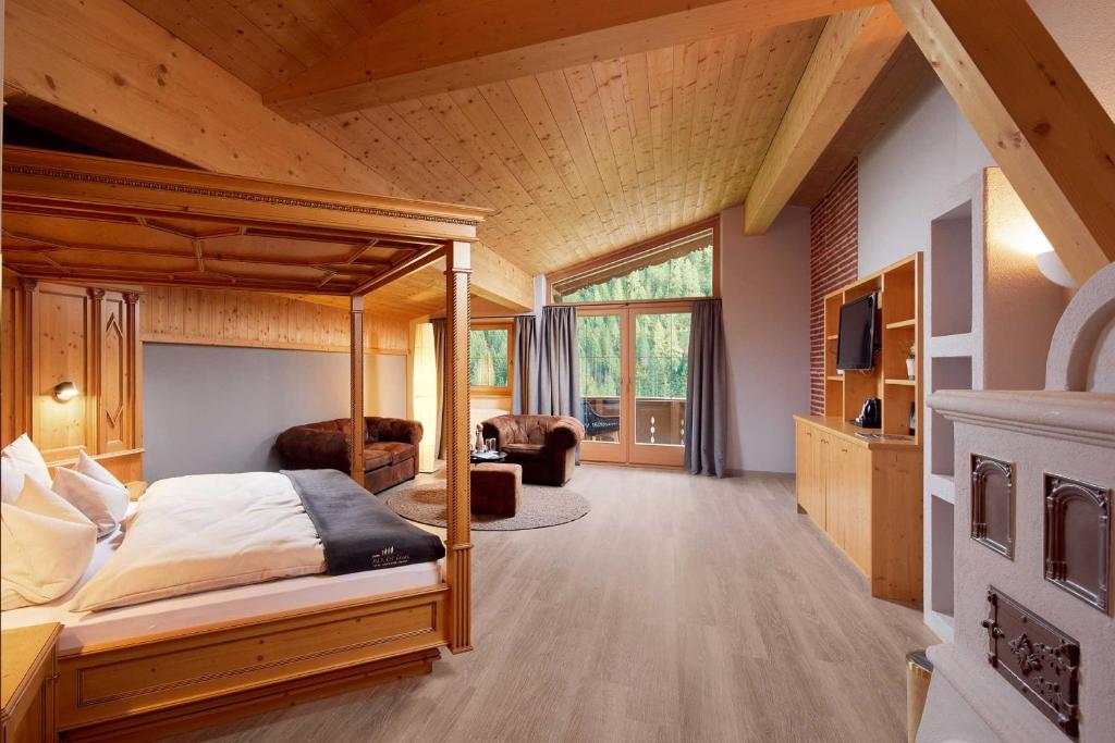 Postel nebo postele na pokoji v ubytování Adler Inn Tyrol Mountain Resort SUPERIOR
