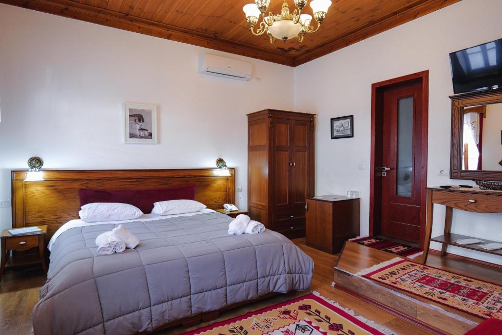 Postel nebo postele na pokoji v ubytování Hotel Bineri