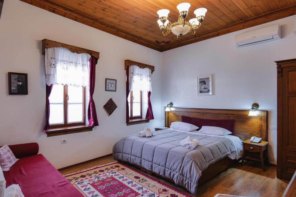 Postel nebo postele na pokoji v ubytování Hotel Bineri