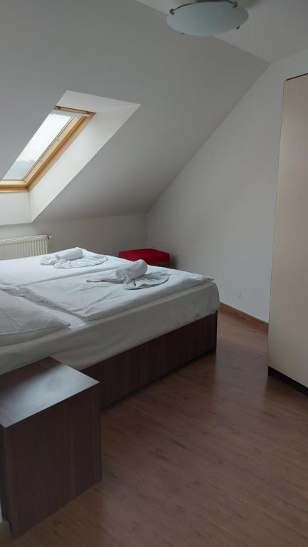 Postel nebo postele na pokoji v ubytování Residence Vysta
