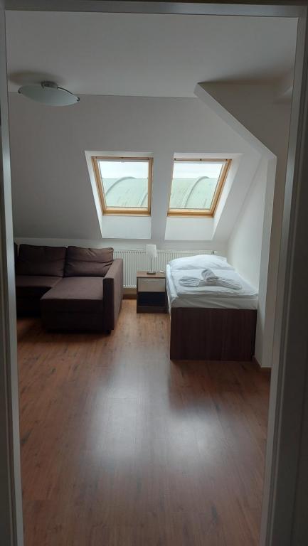 Postel nebo postele na pokoji v ubytování Residence Vysta
