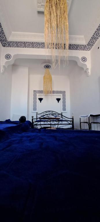 Postel nebo postele na pokoji v ubytování Riad chaoui house
