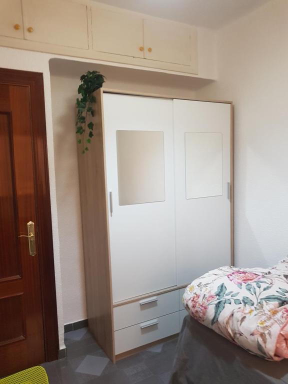 Łóżko lub łóżka w pokoju w obiekcie Kaz Bedrooms