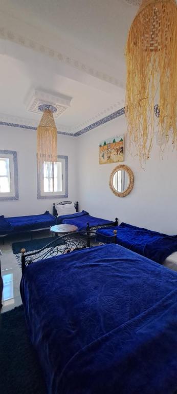 Postel nebo postele na pokoji v ubytování Riad chaoui house