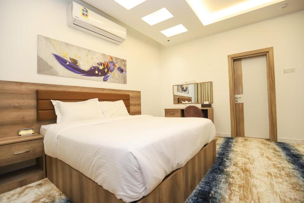 Postel nebo postele na pokoji v ubytování فندق المدينة القديمة Old Town Hotel