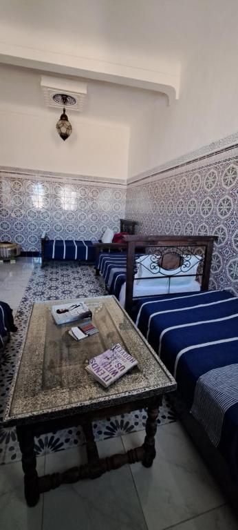 Postel nebo postele na pokoji v ubytování Riad chaoui house