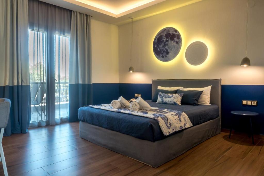 Postel nebo postele na pokoji v ubytování Asteris Village