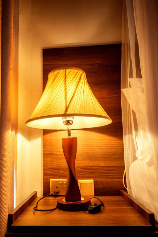 Postel nebo postele na pokoji v ubytování Koki Hotel