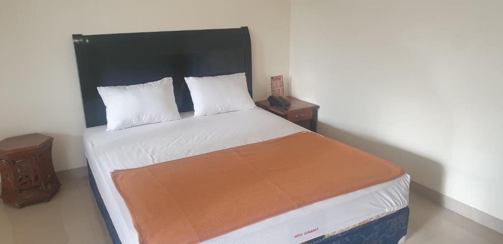 Postel nebo postele na pokoji v ubytování HOTEL CIPUNAGA