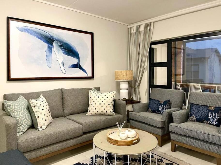 a living room with a couch and a table at 427 Ballito Hills - Lovely 3 bedroom apartment in Ballito