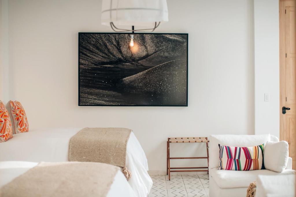 Postel nebo postele na pokoji v ubytování LOtel-Casa Arca