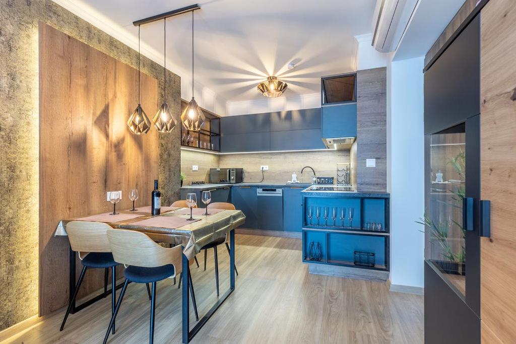Kuchyňa alebo kuchynka v ubytovaní Gold Mandala Apartman Siófok By BLTN
