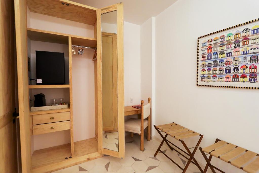 TV a/nebo společenská místnost v ubytování LOtel-Casa Arca