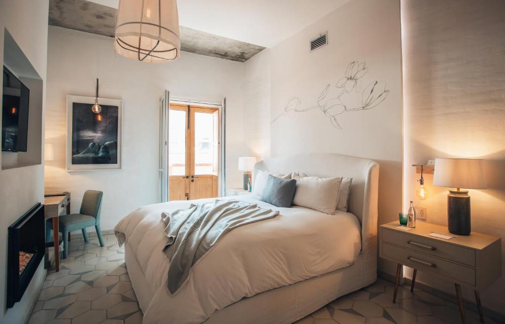 Postel nebo postele na pokoji v ubytování LOtel-Casa Arca
