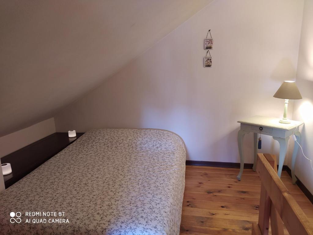Postel nebo postele na pokoji v ubytování Appartamento Bucaneve
