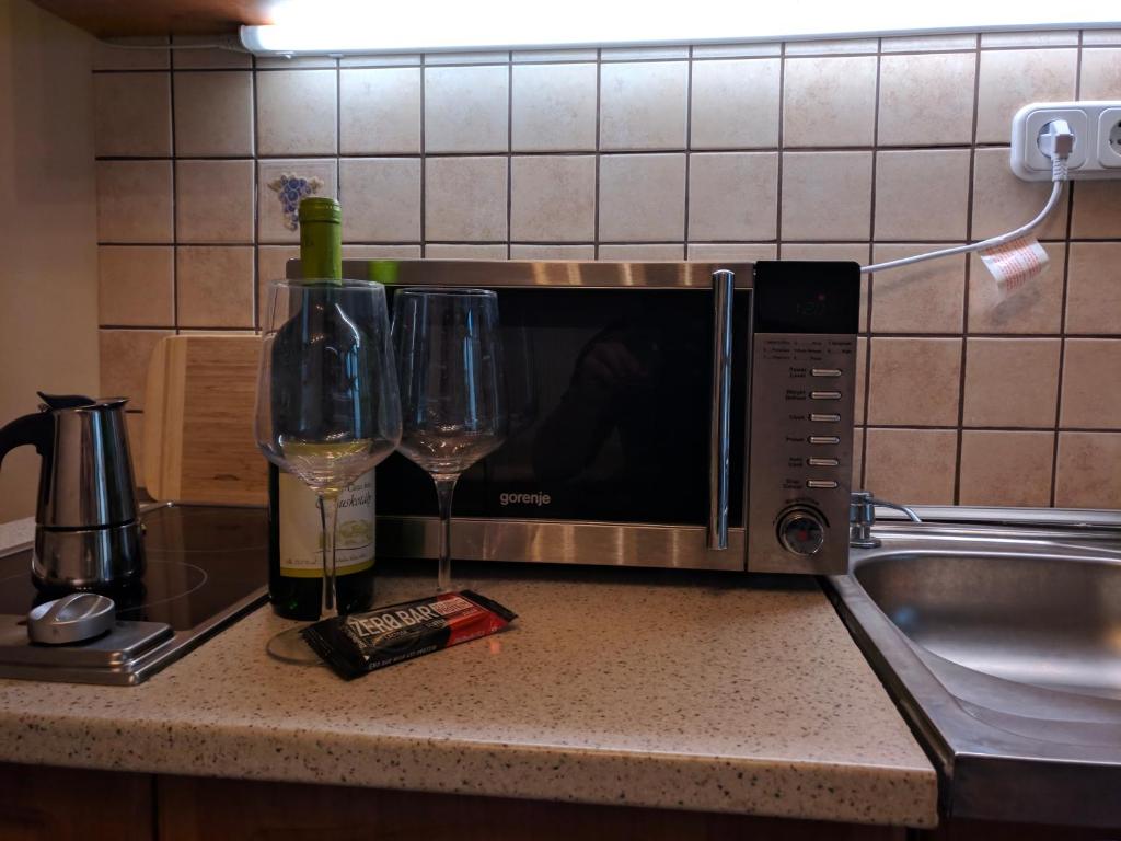 Kuchyňa alebo kuchynka v ubytovaní Cseresznyés apartman