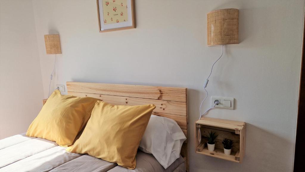 A bed or beds in a room at El Callejón
