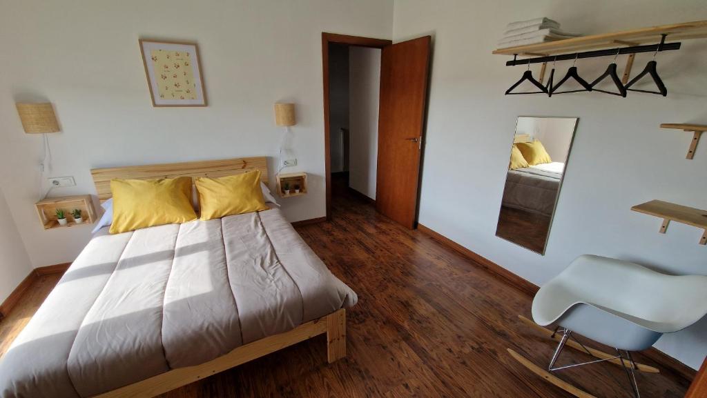 A bed or beds in a room at El Callejón