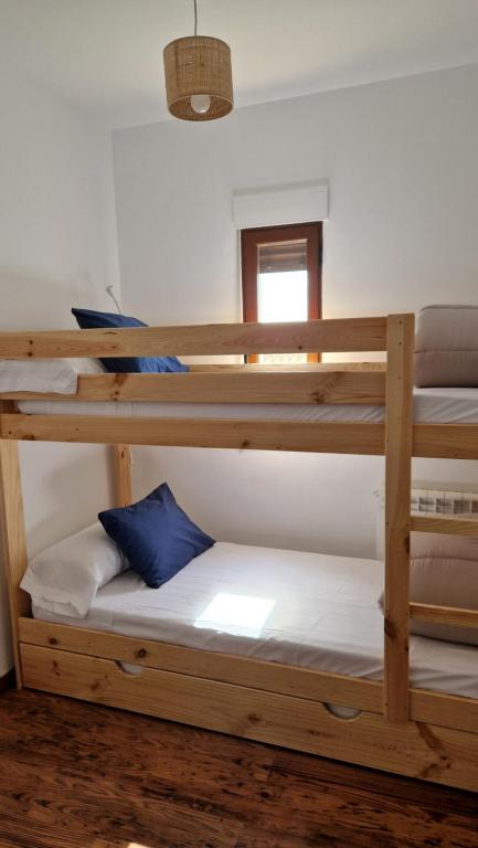A bed or beds in a room at El Callejón
