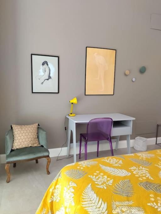 A bed or beds in a room at La vetrina sulla città
